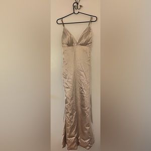 New, never worn. Gold polyester maxi dress/gown. Perfect for an occasion.